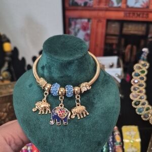 Gold Elephant Charm Bracelet with Blue Accents
